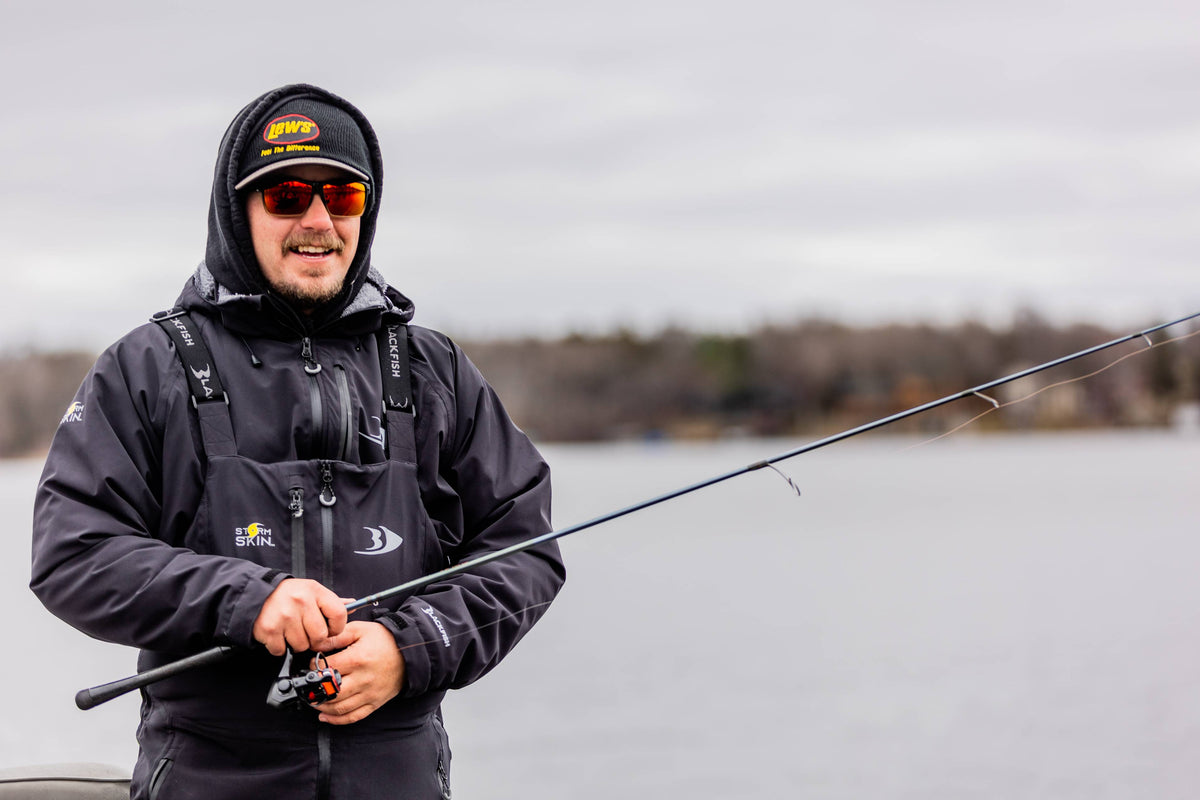 Angler wearing polarized fishing sunglasses while sight fishing